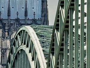 Cologne Cathedral and the Hohenzollern Bridge, the host city for a large international developer conference