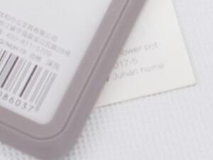 Blank ID badge holder with barcode on a lanyard, ready for onsite printing at an exhibition or conference